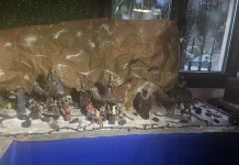 Retamar estrena su belén con una merienda y música de villancicos